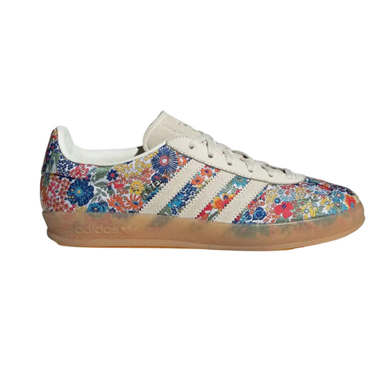 Adidas sneaker with floral pattern on a white background